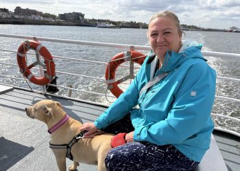 Rita Holmes and dog Nellie on board the restored Shields Ferry service on Monday, April 27. Photo: LDRS