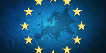 Image of an outlinr of Europe inside the EU flag