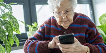 woman checking phone