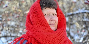 woman in red scarf
