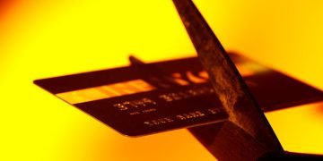 credit card being cut